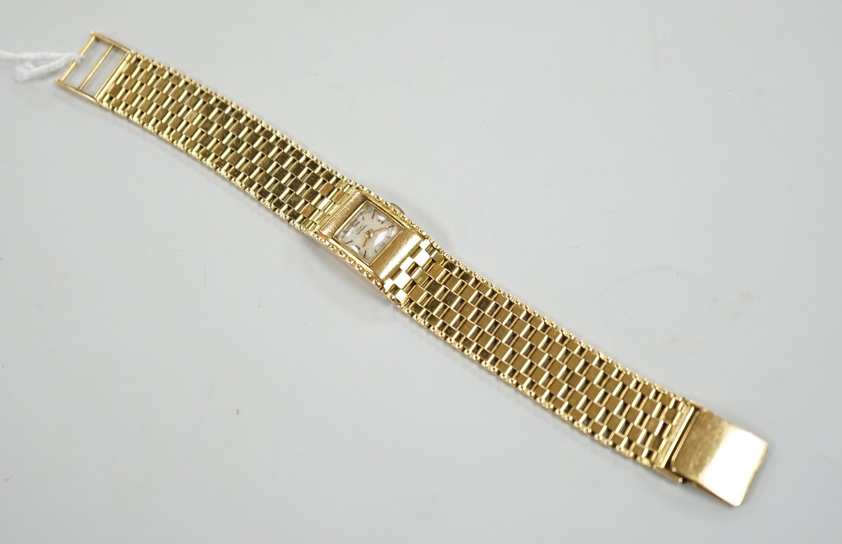 A lady's 18ct gold Girard Perregaux manual wind bracelet watch, overall 17.5cm, gross weight 44.6 grams.